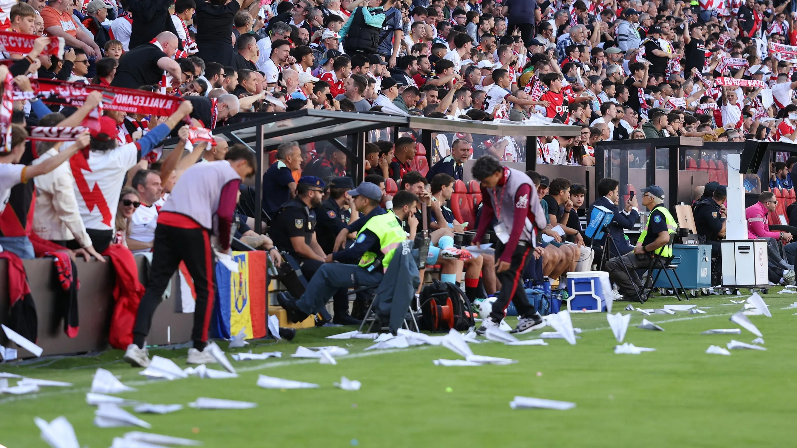 Rayo Vallecano fans throw paper planes onto the pitch in protest of Raul Martin Presa, president of Rayo Vallecano