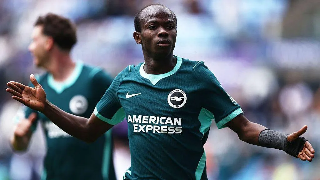 Malick Yalcouye celebrates scoring Brighton's second goal during the Premier League game against Coventry City 