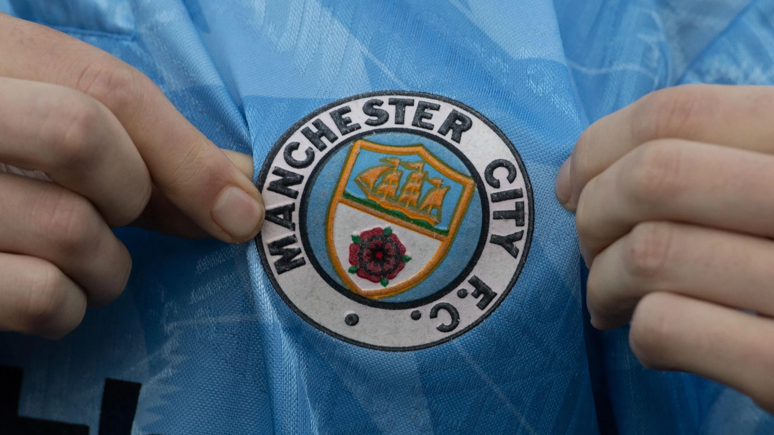 A detailed view of a Manchester City crest before the Premier League 2026/27 match between Crystal Palace FC and Manchester City at Selhurst Park