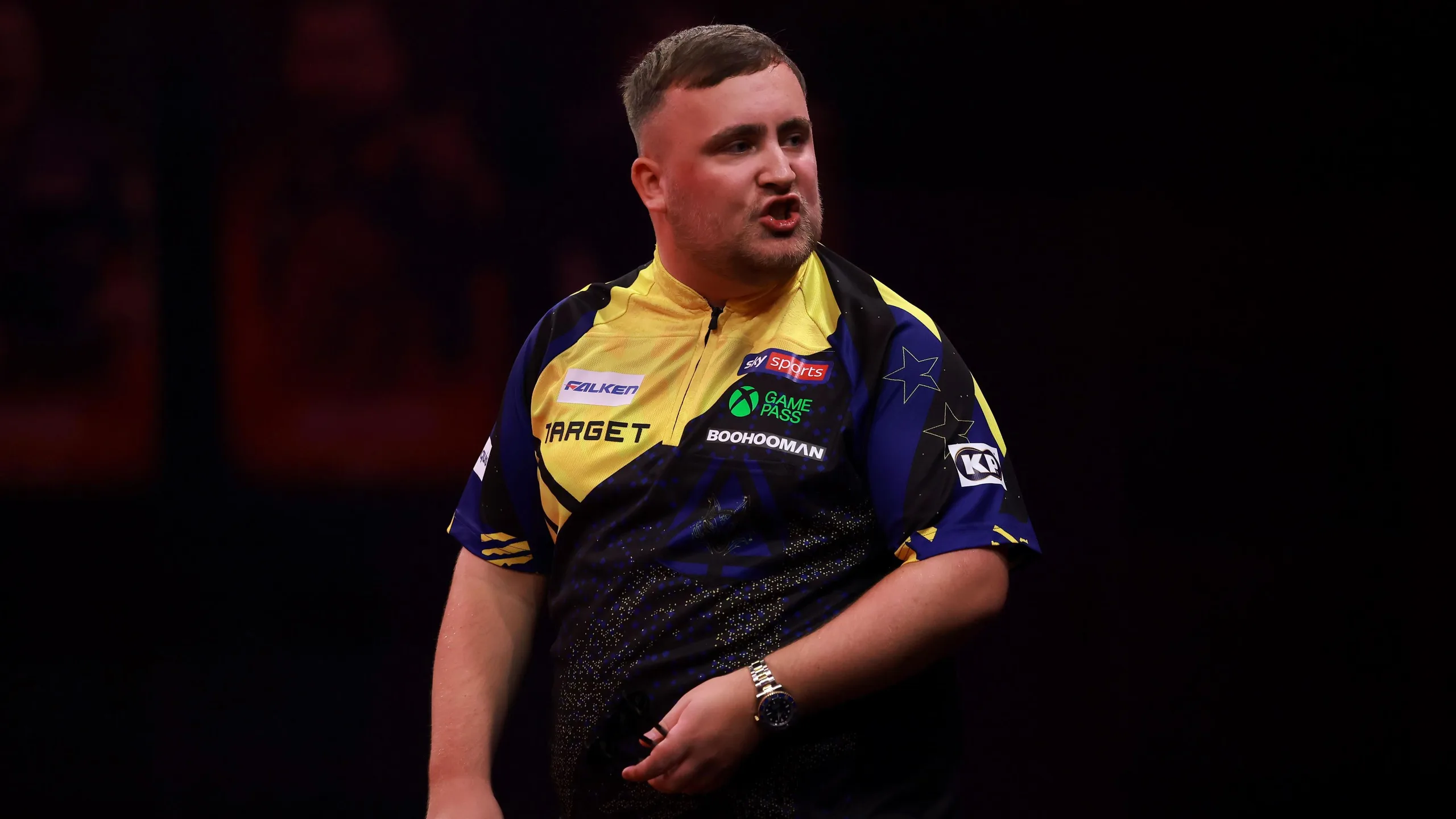 Luke Littler during a darts match