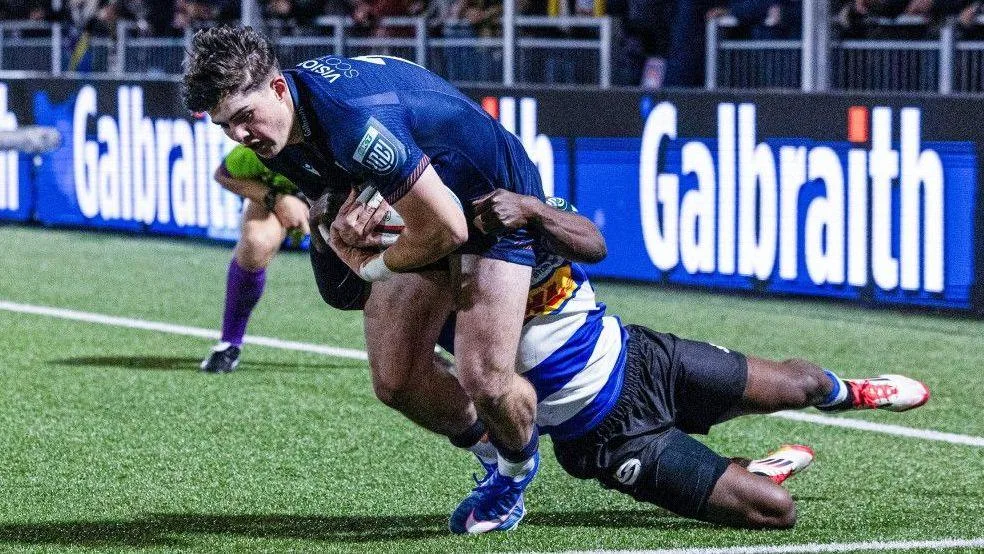 Rory McHaffie scores a try for Edinburgh