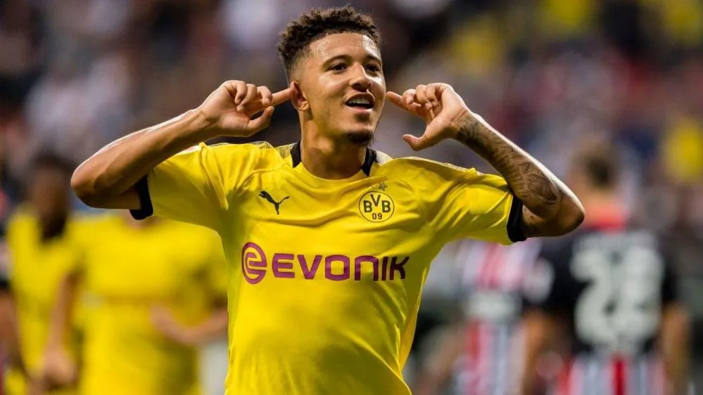 Jadon Sancho celebrates