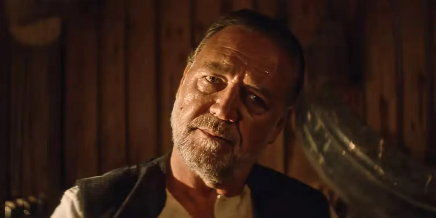 Russell Crowe listening to someone in The Weight