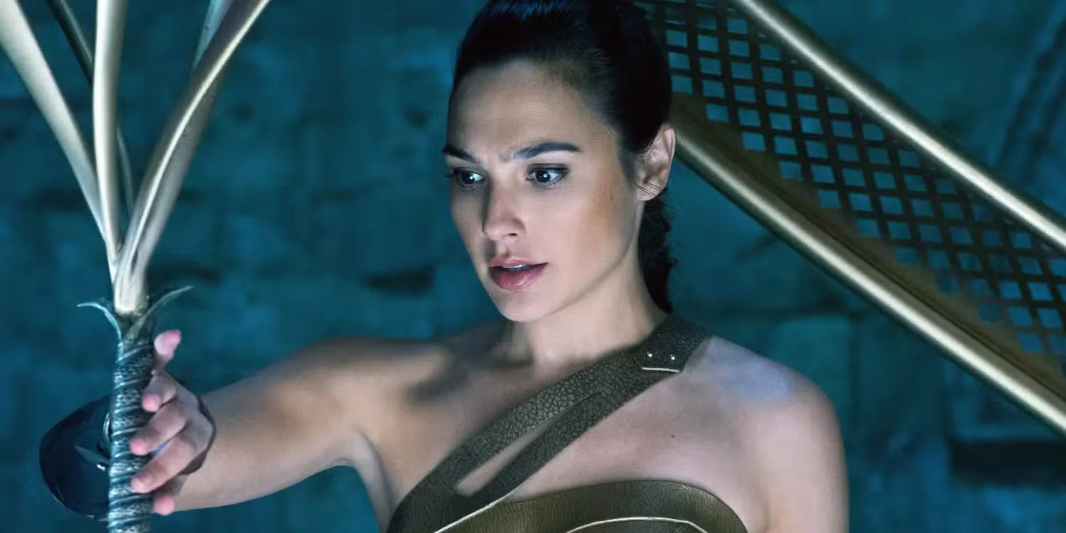 Gal Gadot staring at a break object in Wonder Woman