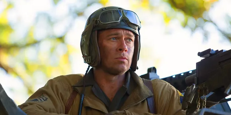 Brad Pitt as Wardaddy wearing a helmet in Fury