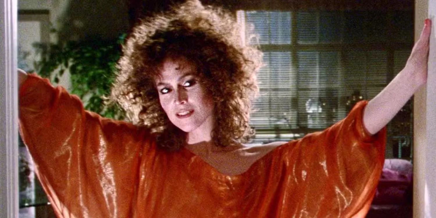 Sigourney Weaver standing in the doorway as Zuul, a spirit possessing the body of Dana Barrett in Ghostbusters (1984)