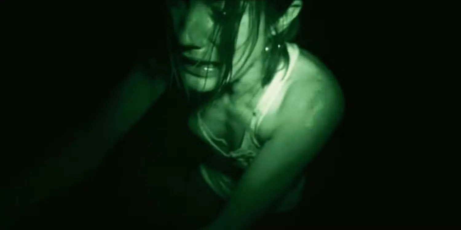Jennifer Carpenter as Angela through the lens of a camera's night vision mode in Quarantine