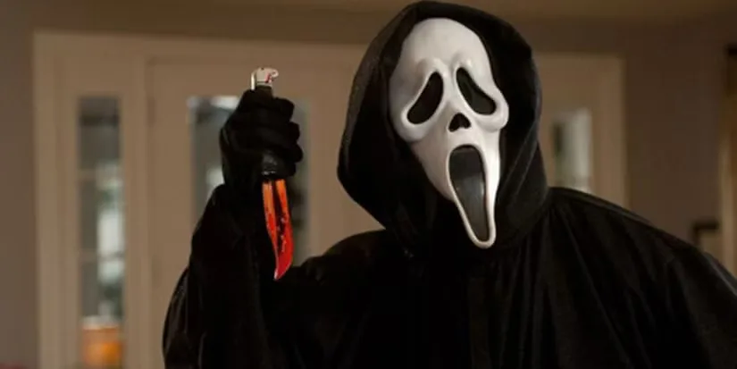 Ghostface holds a bloody knife in 'Scream 4'.
