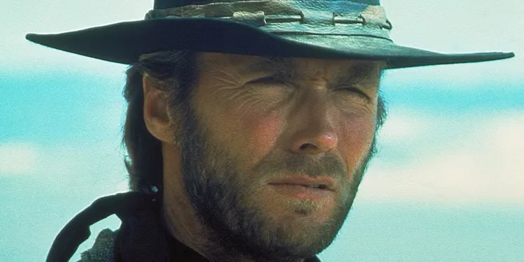 Clint Eastwood as The Stranger looking at a person offscreen in High Plains Drifter