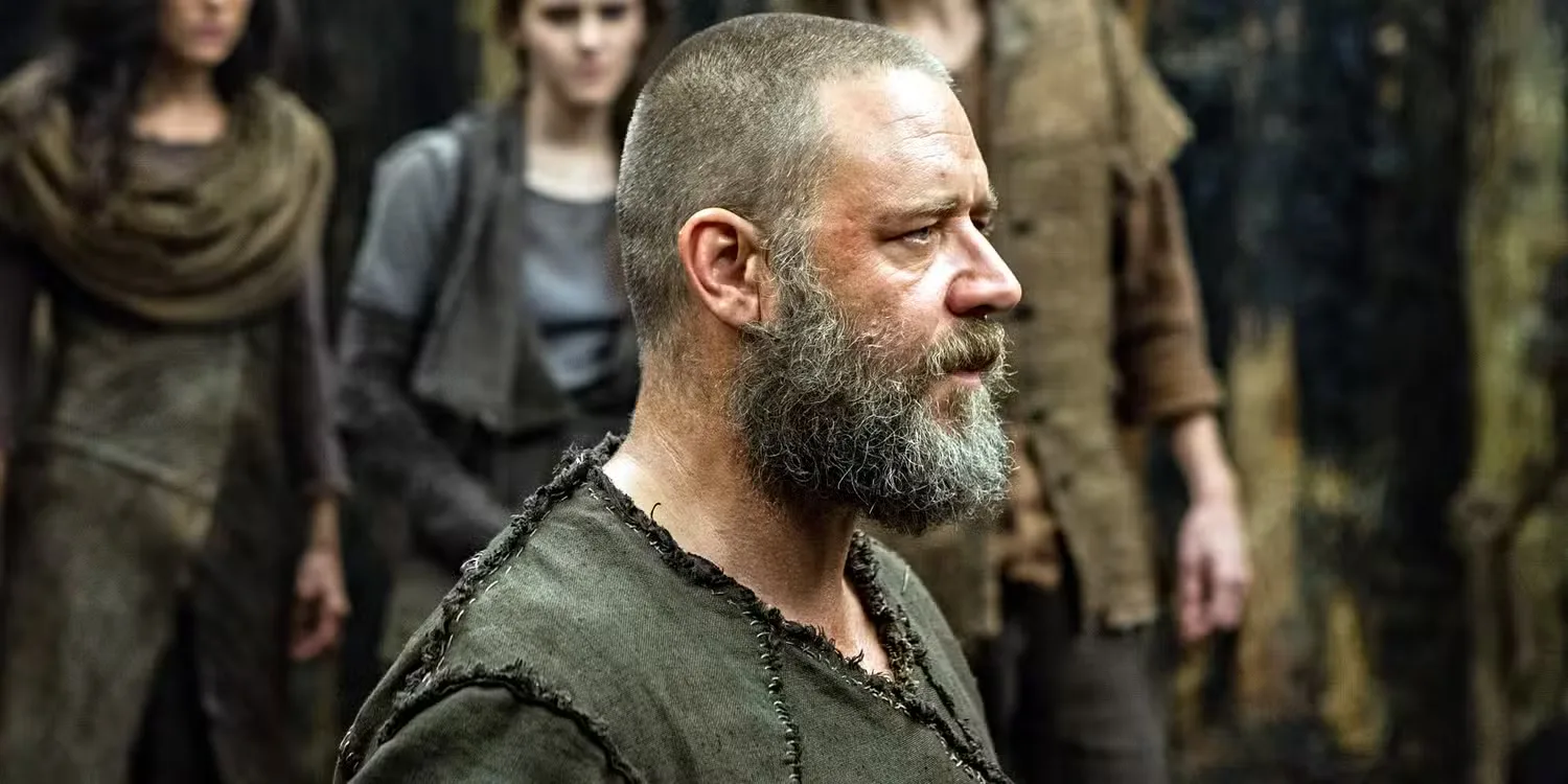Russell Crowe in profile with a crowd behind him in Noah