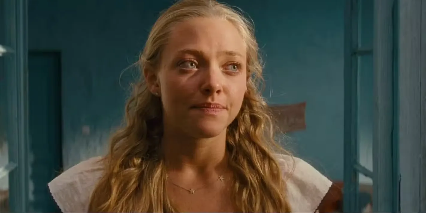 Sophie Sheridan, played by Amanda Seyfried, looks out from a balcony in 'Mamma Mia!'