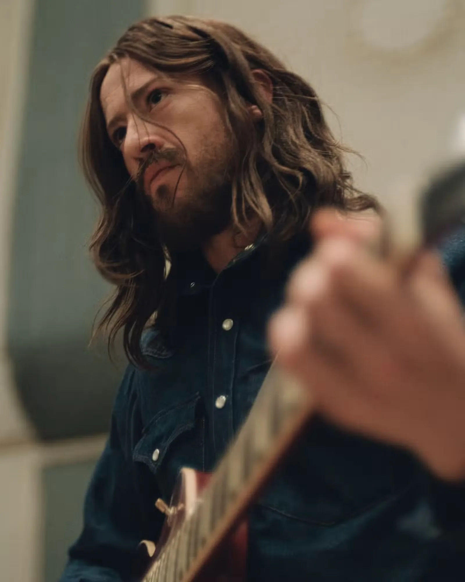 Joseph Quinn as George Harrison