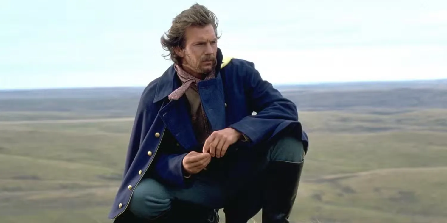 John Dunbar keenling in the desert and looking to the distance in Dances with Wolves.