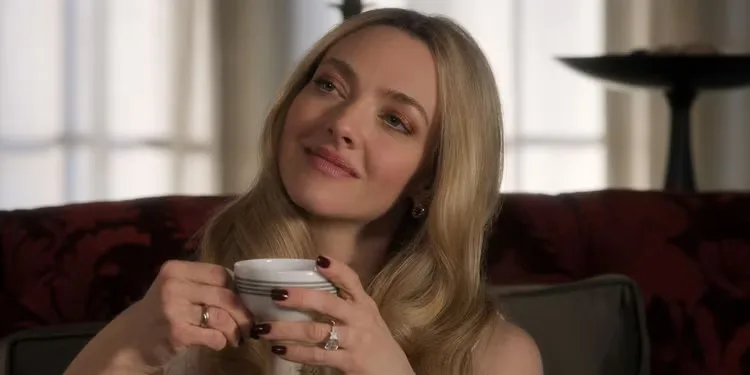 Amanda Seyfried in 'The Housemaid' drinking tea