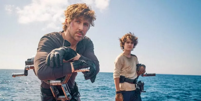 Ryan Gosling and Flynn Gray posing on a raft on an ocean world for Star Wars: Starfighter