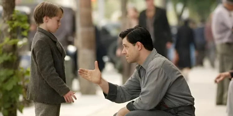 Jim Braddock (Russell Crowe) teaching his son a lesson about honesty in 'Cinderella Man.'