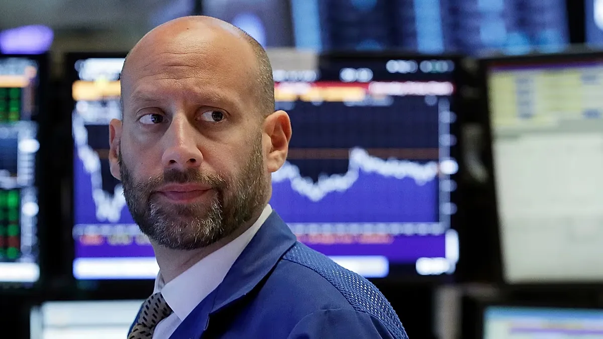 File - Specialist Meric Greenbaum works on the floor of the New York Stock Exchange, Wednesday, 14 June 2017.