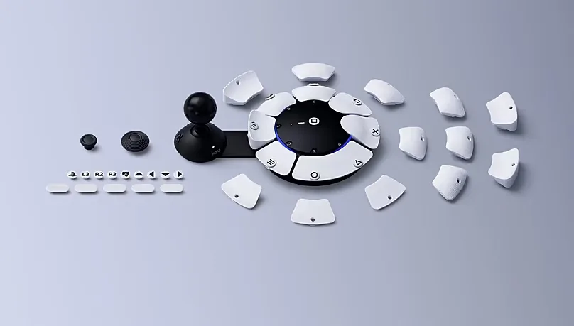 Sony controller, with the pieces laid out ready to be assembled