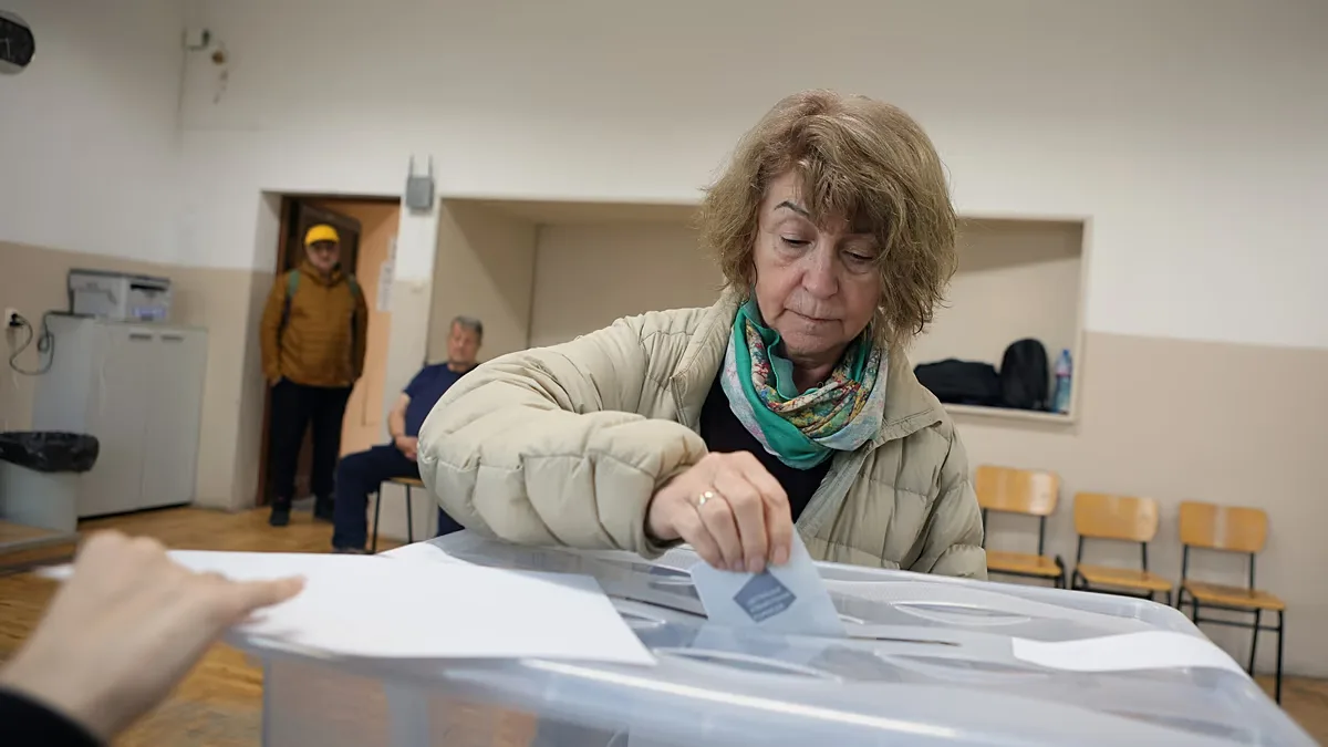 A voter casts her vote for a presidential election in Sofia, Bulgaria, Sunday, 25 Oct, 2026.