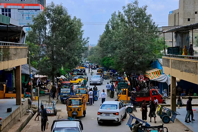 People walk through Mekelle, the capital of Ethiopia's Tigray region, as fighting intensifies on 24 September 2026.
