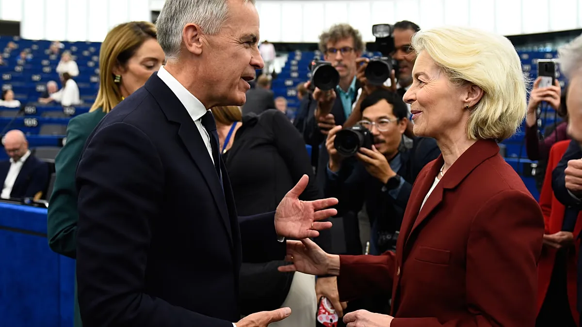 Canada's Prime Minister Mark Carney, front left, speaks with European Commission President Ursula von der Leyen at the European Parliament in Strasbourg.