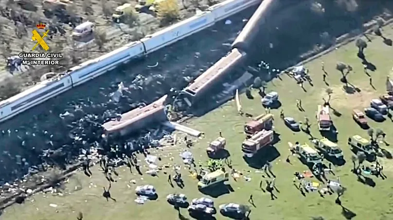 This image, taken from a video released by the Civil Guard, shows an aerial view of the carriages and emergency services at the scene of the accident, where rescue operations are continuing.