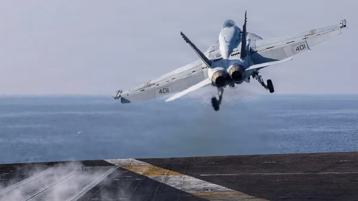 FILE: An F/A-18E Super Hornet launching from the flight deck of US Navy aircraft carrier USS Abraham Lincoln on Day 1 of Iran war, 28 February 2026