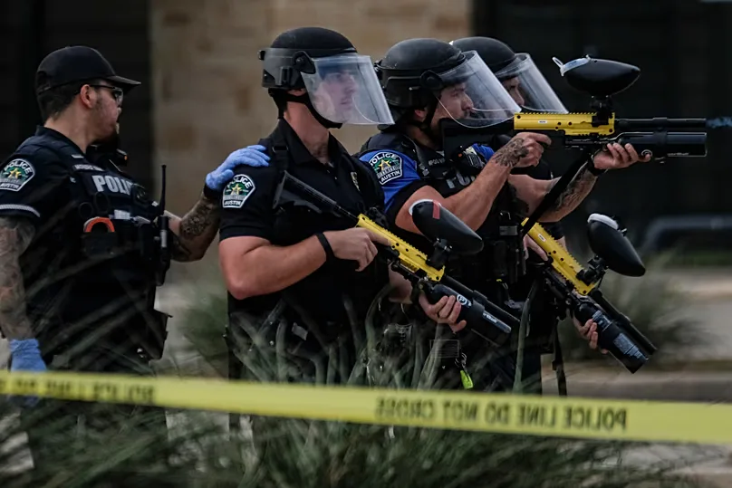 Authorities deploy non-lethal weapons near a demonstration where a man was shot in his vehicle by an ICE officer in Austin, 20 September, 2026