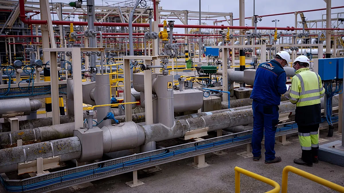 FILE. Operators work at Enagas regasification plant, the largest LNG plant in Europe, in Barcelona, Spain, 29 March 2022