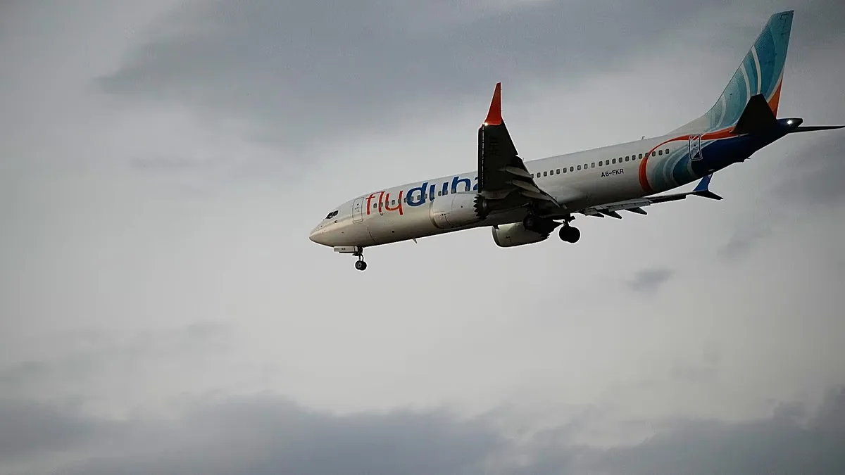 An FlyDubai plane carrying Israeli passengers who had earlier been aboard another FlyDubai aircraft that made an emergency landing in Saudi Arabia approaches near Tel Aviv.