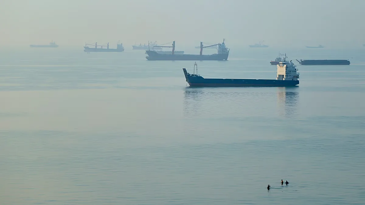 Cargo ships are anchored in the Strait of Hormuz off Bandar Abbas, Iran, on 28 September 2026.