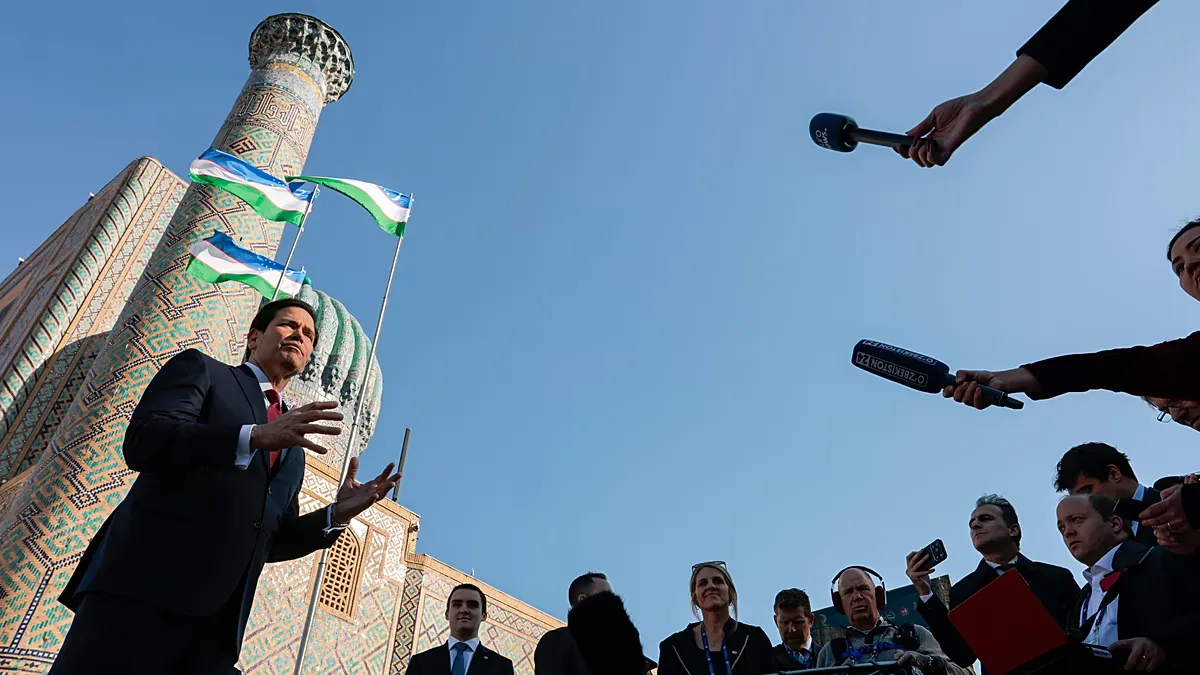 U.S. Secretary of State Marco Rubio, left, speaks to the press at Registan Square in Samarkand, Uzbekistan 