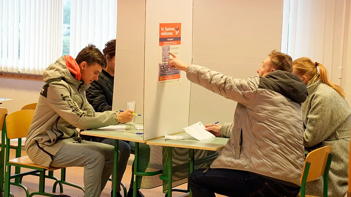 FILE: Polling stations opened Saturday in Latvia for a general election, Riga, Latvia, Saturday, Oct. 1, 2022.