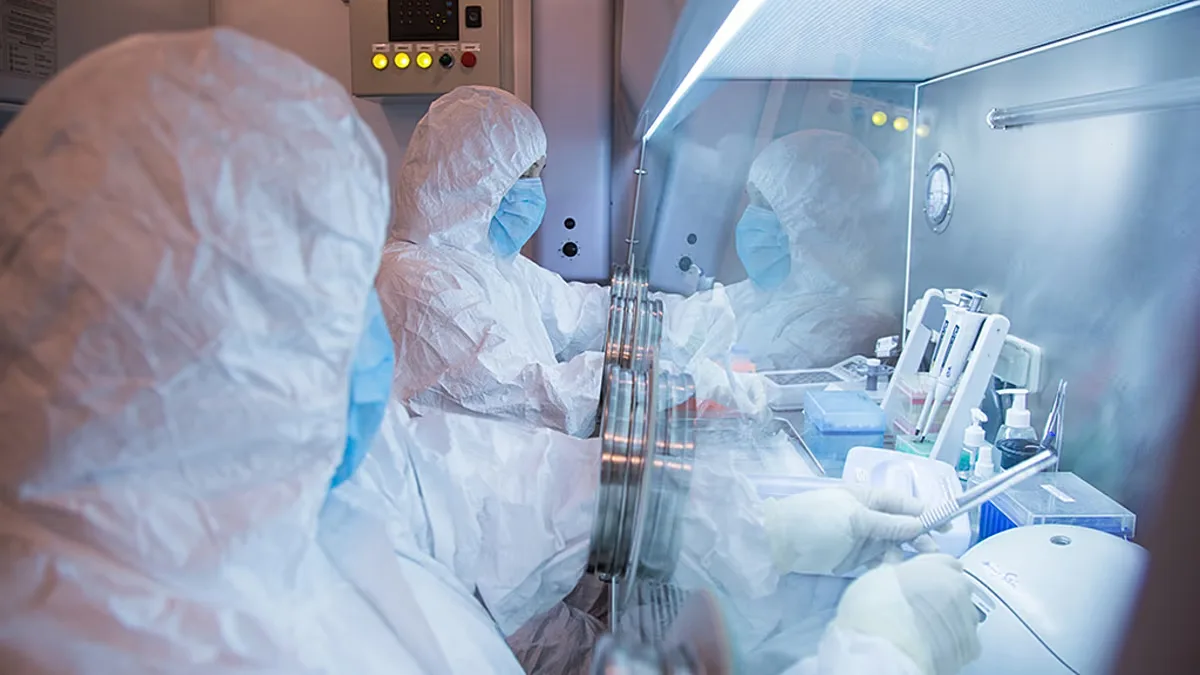 In this undated handout photo released by the Irkutsk Anti-Plague Research Institute, staff are seen working in a laboratory.