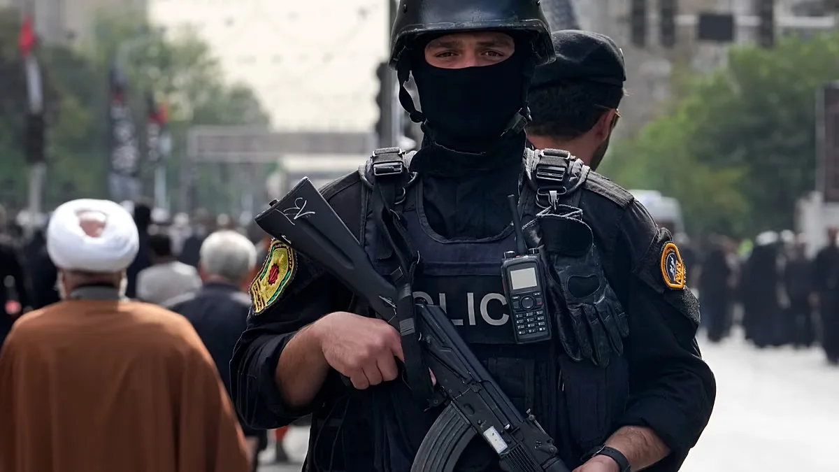 FILE: An Iranian police officer stands guard at Azadi (Freedom) St. in Tehran, 1 August 2024