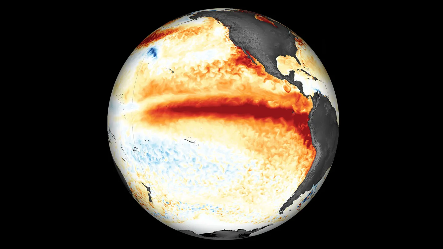 A red slash that reaches from the mid Pacific Ocean to South America, along with other hot spots along the U.S. West Coast map how El Niño is heating up the sea surface in this image of a globe.