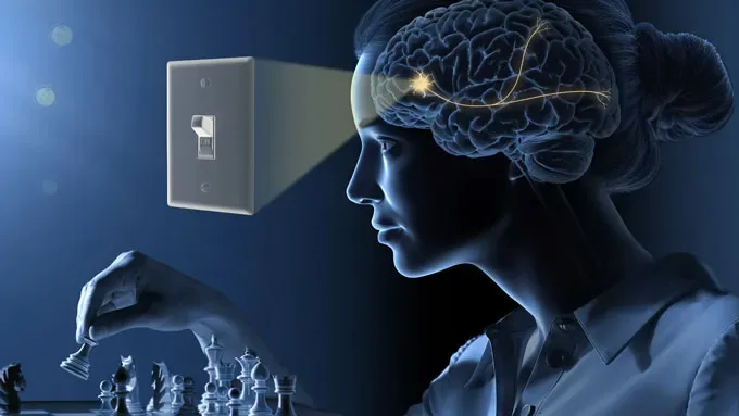 An illustration of a light switch and the brain of a person playing chess.
